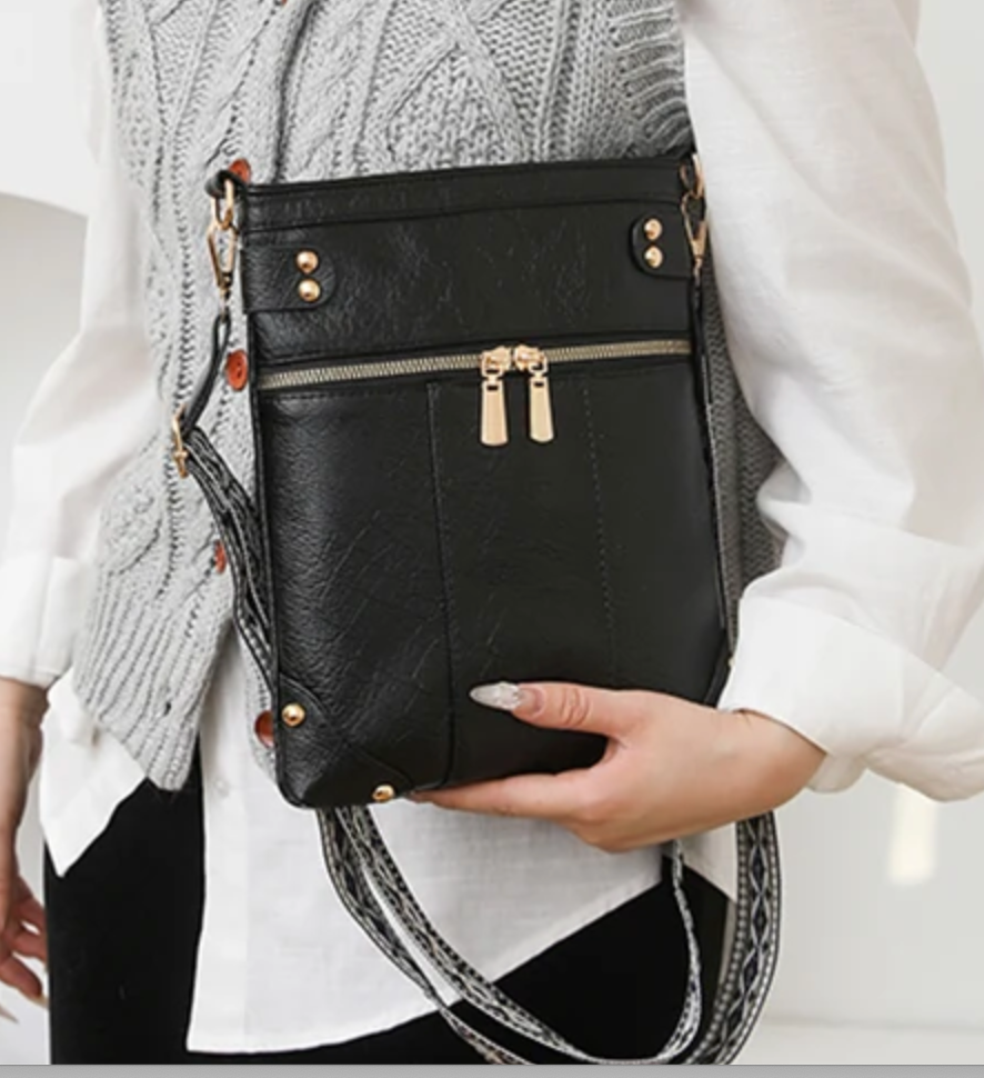 BLACK LEATHER MINI CROSSBODY DROPS.   SEPT 10