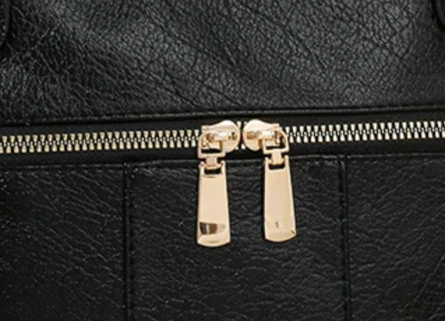 BLACK LEATHER MINI CROSSBODY DROPS.   SEPT 10