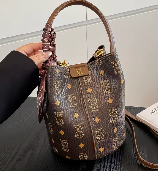 BABY BEAR MONOGRAMMED LEATHER BUCKET BAG