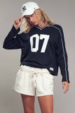 CHANNEL RETRO Varsity 07 Graphic V-Neck Jersey
